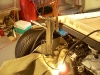 Connect rear strut link to frame 15          