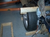 Connect rear strut link to frame 25          